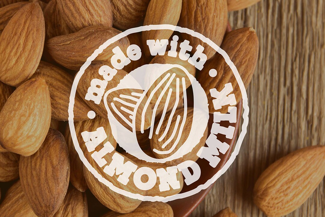 Stół z migdałami, logo „Made with Almond Milk”